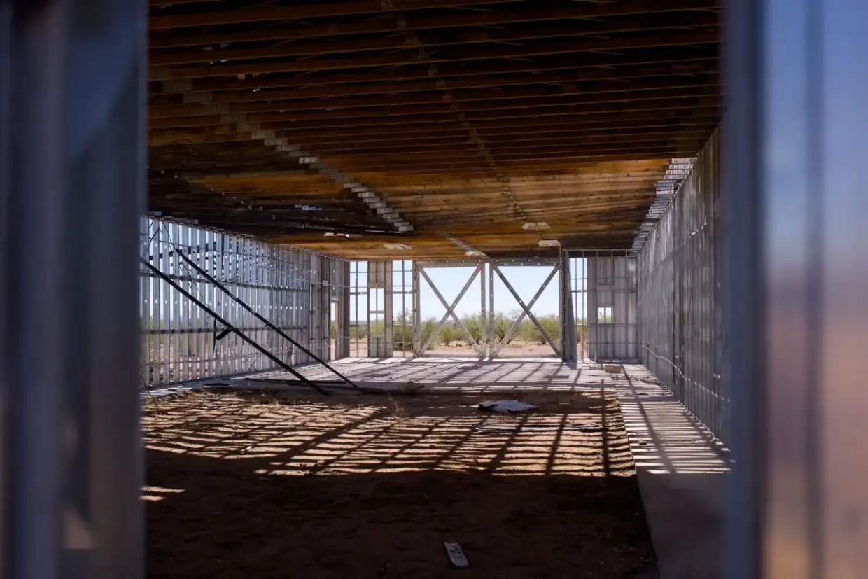 Metal stud framing overhead in a commercial ceiling before drywall goes up