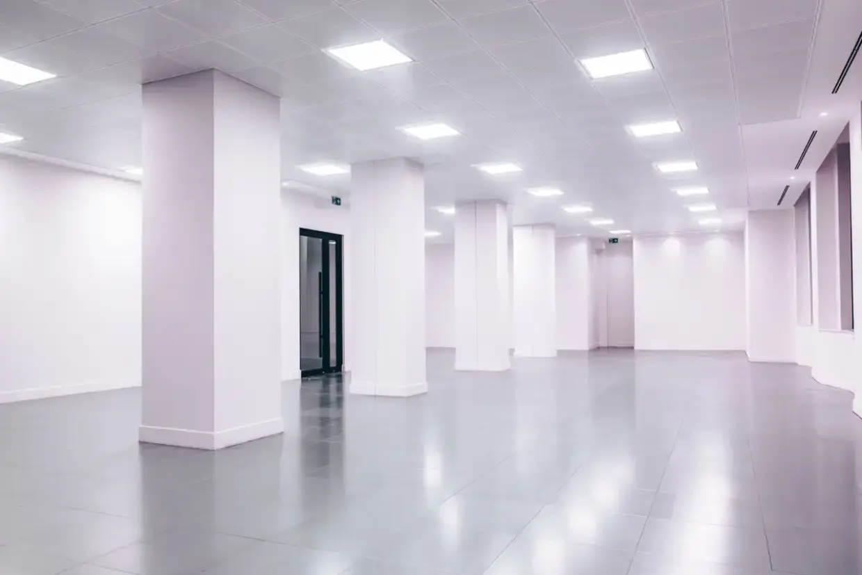 Finished office interior showing the even lighting that makes a mismatched repair visible